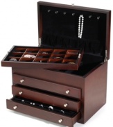 Store and protect sentimental keepsakes in a walnut jewelry box from Wallace. Drawers, hooks, pockets and compartmentalized spaces for every accessory make it invaluable for an ever-expanding jewelry collection.