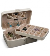 Beautiful inside and out, the Remy jewelry box houses innumerable trinkets between a lift-out drawer, divided sections and in-lid catch. A rich faux leather exterior and sparkling crystal snap add elegance to the practical storage solution by Mele & Co.