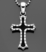 A twist on traditional. This stainless steel and black rubber cross pendant features silvertone bolts for a trendy effect. Chain measures 30 inches; drop measures 3 inches.