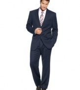 Timeless sophistication and formal style go hand in hand with this navy wool suit.