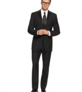 Exquisitely tailored in a fine serge wool, this elegantly modern tuxedo combines classic style with modern details for formal look that's not fussy. Sophisticated, fully lined three-button jacket features a notched satin lapel, chest welt pocket, front flap pockets with satin besom, three interior pockets and four-button detail at cuff. All buttons are satin covered for a subtle sheen. No back vent. Single-pleat pant features zip fly with extended tab closure, on-seam pockets, suspender buttons and an elegant satin side stripe. Unfinished hem. Jacket and pant sold together.