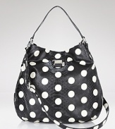 MARC BY MARC JACOBS' snake-embossed hobo makes a dotty statement. Get inspired by the spot-splashed runways and shoulder this graphic grab as a day-to-day take on the trend.