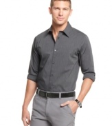 A mini-striped pattern gives it texture, non-iron fabric gives it toss-it-on-and-go ease. This Calvin Klein shirt is an all-around winner.