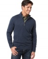 Layer up with the soft look and feel of this classic ribbed quarter-zip sweater from Geoffrey Beene.