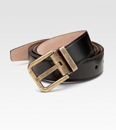 A fine calfskin leather belt finished with a distressed metal buckle. About 1¾ wide Made in Italy 