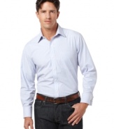 Look sharp in a slimmed down style with the sleek and trim fit of this striped AJ Izod shirt. (Clearance)