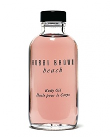 A unique, moisturizing body oil that gives skin a sultry sheen as it scents with Beach Fragrance. Contains four essential oils (Olive, Sesame, Avocado and Jojoba) and Vitamins E and C to soften and nourish skin. A unique, moisturizing body oil that gives skin a sultry sheen as it scents with Beach Fragrance. Contains four essential oils (Olive, Sesame, Avocado and Jojoba) and Vitamins E and C to soften and nourish skin.