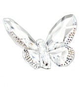 Dazzling in the wings. This bejeweled butterfly reflects the light beautifully with fully faceted wings edged in glittering crystal dots. A special figurine from Swarovksi.