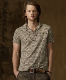Putting a downtown spin on a preppy style icon, this short-sleeved polo in cotton jersey gives off some serious surplus attitude with rustic stripes. Putting a downtown spin on a preppy style icon, this short-sleeved polo in cotton jersey gives off some serious surplus attitude with rustic stripes.