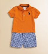 A classically preppy set includes a cotton mesh polo, gingham short and coordinated madras ribbon belt. Shirt Ribbed collarShort sleevesFront buttonsEven vented hem Shorts Front buttonZip flyRear elasticized waist with belt loops and grosgrain beltOpen hand pocketsBack welt pocketCottonMachine washImported Please note: Number of buttons/snaps may vary depending on size ordered. Additional InformationKid's Apparel Size Guide 