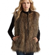 THE LOOKFaux fur designVariegated coloringRound necklineConcealed front hook closure Sleeveless Side seam pocketsTHE FITAbout 26 from shoulder to hemTHE MATERIALAcrylic/polyesterFully linedCARE & ORIGINMachine washImportedModel shown is 5'11 (180cm) wearing US size Small. 