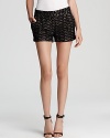 DIANE von FURSTENBERG elevates these charming shorts with exquisite lace for an unexpected romantic feel.