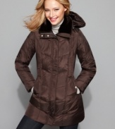 Keep warm in style with this sleek puffer from MICHAEL Michael Kors. Faux fur trim keeps the look sophisticated and right on trend. (Clearance)