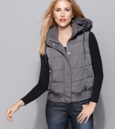 Layer your winter look with Calvin Klein's hooded vest. A wind resistant placket makes it just right for shielding yourself from the elements. (Clearance)