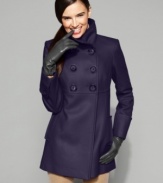 Create a stylish outerwear look this season with MICHAEL Michael Kors' chic double breasted coat. Wear it with everything from jeans to pencil skirts! (Clearance)