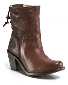 Kicky and chic, these abbreviated booties lace up the back for a striking exit. By Frye.