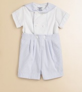 A charming, sailor-inspired set includes a pique button-down shirt and pleated seersucker shorts for a nautical ensemble. Shirt Rounded collar with striped trimShort sleeves with striped trimDouble-breasted button-front with striped trim50% polyester/50% cotton Shorts Button-on shorts Elastic waistbandSlightly pleated67% polyester/33% cottonMachine washImported Please note: Number of buttons/snaps may vary depending on size ordered. 