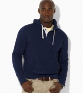 ailored from ultra-soft fleece and washed for a vintage look, the classic-fitting pullover with a drawstring hood is designed to replicate a rugby shirt.