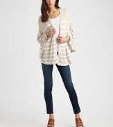 Striped, semi-sheer topper has an open front, long cape sleeves and a lengthy silhouette. Open frontLong cape sleevesLonger length hits below the hips60% rayon/40% cottonHand washImportedModel shown is 5'10 (177cm) wearing US size Small.