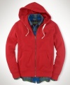 A classic-fitting full-zip hoodie in soft-washed cotton fleece is smooth on one side with a soft, fuzzy interior.