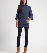 Slouchy, wool and cashmere-rich turtlneck with three-quarter dolman sleeves and a lengthy silhouette. TurtleneckThree-quarter dolman sleevesSplit kangaroo pocketRibbed cuffs and hemLonger length hits below the hips62% virgin wool/26% cashmere/12% polyamideDry cleanImportedModel shown is 5'10 (177cm) wearing US size 4.