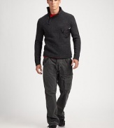 Edgy and modern in luxe lambswool, an essential mockneck sweater gets a sporty update with an asymmetrical half-zip placket and an angled taffeta pocket at the chest.Mockneck collarRibbed collar, cuffs and hemLambswoolDry cleanImported