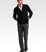 A new cold-weather classic is shaped from extra-fine wool yarns with a covered zip placket and stand collar. Side pockets Wool Dry clean Imported 