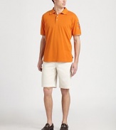 Supremely comfortable cotton piqué in a timeless short-sleeve silhouette, accented with multicolor embroidery on one sleeve.Polo collar Button placket with embroidery detailShort sleeves with contrast tippingCottonMachine washImported