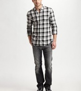 Smart squares in neutral tones on soft brushed cotton, with a little swagger and lots of ease.Shirt collar with button tab Button placket Two patch chest pockets, one with button flap, the other with embroidered logo Back yoke and center seam Long sleeves with button cuffs Cotton Machine wash Imported