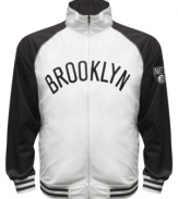 The Most Valuable Fan wears this baseball style running jacket featuring the Brooklyn Nets by Majestic.