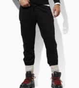 The essential track pant is crafted with modern racing stripes in tight-knit interlock cotton for a sleek finish and a luxuriously soft hand.
