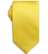 A lustrous solid tie is the perfect worry-free complement to your sophisticated office attire.