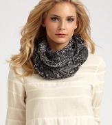 Slither into chic style in a fine gauzy design with baby fringe and logo embroidery. WoolAbout 45½ X 69½Dry cleanImported