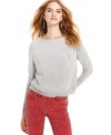 Don't be fooled by the classic front design, this sweater is all about the flip side! A large split opening at the back bares major skin -- and brings a dose of edge to the classic layer. Pair the sweater with a tank for style that's more demure -- or a cropped bandeau top on days when you're feeling bold.