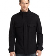 THE LOOKStand collar with snap throat tabKnit storm collarZip front with snap storm flapChest patch pockets; waist slash pocketsSnap tabs at cuffsStraight back yokeBack shoulder gussetsTHE FITAbout 26 from shoulder to hemTHE MATERIALShell: 80% wool/20% cashmereFill: polyesterFully linedCARE & ORIGINDry clean Imported