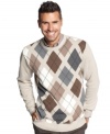 Clearly a classic. The argyle pattern of this Oscar de la Renta sweater gives your style a timeless touch.