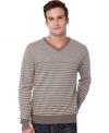 In a classic V-neck cut, with modern striped detail, this sweater from Buffalo David Bitton is all you.