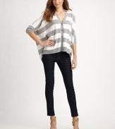 Classic stripes meet a modern silhouette including three-quarter dolman sleeves and a relaxed, poncho-inspired fit.V-neckDolman sleevesButton frontFront pocketsAbout 26 from shoulder to hem52% cotton/45% polyester/3% angoraHand washImported Model shown is 5'10 (177cm) wearing US size Small. 