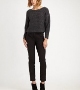 Wool-blend, one-shoulder style with a sassy cropped front. Asymmetrical neckline Cropped front Long sleeves Ribbed cuffs and hem 60% wool/30% cotton/10% polyamide Dry clean Imported Model shown is 5'9½ (176cm) wearing US size 4.