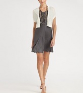EXCLUSIVELY AT SAKS. Delicate sequins add subtle shimmer to this cropped, knit silhouette.V necklineConcealed snap frontCap sleevesRib-knit hemlineAllover sequinsAbout 18 from shoulder to hem75% linen/25% silkDry cleanMade in ItalyModel shown is 5'11 (180cm) wearing US size Small. 