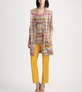Oversized striped melange wool cardigan gathers in the back for a slimming fit.Long sleevesPatch pocketsBack gathersAbout 32 from shoulder to hemWoolHand washImportedModel shown is 5'9 (175cm) wearing US size 4. 