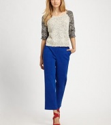 A textured popcorn knit and bold two-tone style makes this cozy sweater both laid-back and trendy.Roll neckElbow-length sleevesCroppedAbout 22 from shoulder to hemBody: 87% cotton/13% polyesterFront: 93% cotton/5% polyester/2% polyamideDry cleanImported
