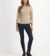 Ribbed sweater knit styled with a flared front peplum.BoatneckSleeves hit above wristsPullover styleAbout 22 from shoulder to hemCottonDry cleanImportedModel shown is 5'9 (175cm) wearing US size Small.
