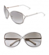 Metal crossover butterfly shaped frame enhanced with enamel insert. Available in shiny rose gold with ivory enamel and bronze mirror lens.100% UV protection Made in Italy 