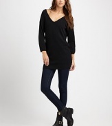 Cashmere v-neck with three-quarter sleeves, dropped shoulders and an open v-back. V-neckDropped shouldersThree-quarter sleevesOpen v-backAbout 34 from shoulder to hemRibbed cuffs and hemCashmereDry cleanImportedModel shown is 5'11 (180cm) wearing US size 4.