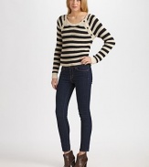 Surrounded by bold stripes, this fitted cotton scoopneck has long dolman sleeves and asymmetrical button closures at the left shoulder. Ribbed scoopneckAsymmetrical button closures at shoulderLong sleevesCottonHand washImportedModel shown is 5'10 (177cm) wearing US size small.