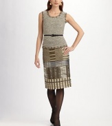 Richly textured, hand-knit design is luxuriously soft with hints of metallic.Sleeveless Pullover Silk lining 60% nylon/40% polyester Dry clean Imported of Italian fabric