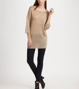 Sparkling metallic knit in a slightly oversized, slouchy pullover.BoatneckDropped shouldersDolman sleevesTied back keyholeAbout 31 from shoulder to hem73% rayon/18% polyester/9% metallic fibersDry cleanImportedModel shown is 5'10 (177cm) wearing US size Small.