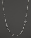 A sterling silver chain necklace with an modern mix of clear quartz stations. From Ippolita.