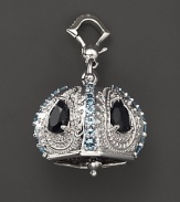 Inspired by Zen philosophy, this polished sterling silver Raja meditation bell from Paul Morelli is set with blue topaz and black spinel.